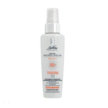 Bionike Triderm A.K. Слънцезащитен флуид с много висока защита SPF50+ за чувствителна и нетолерантна кожа x50 мл